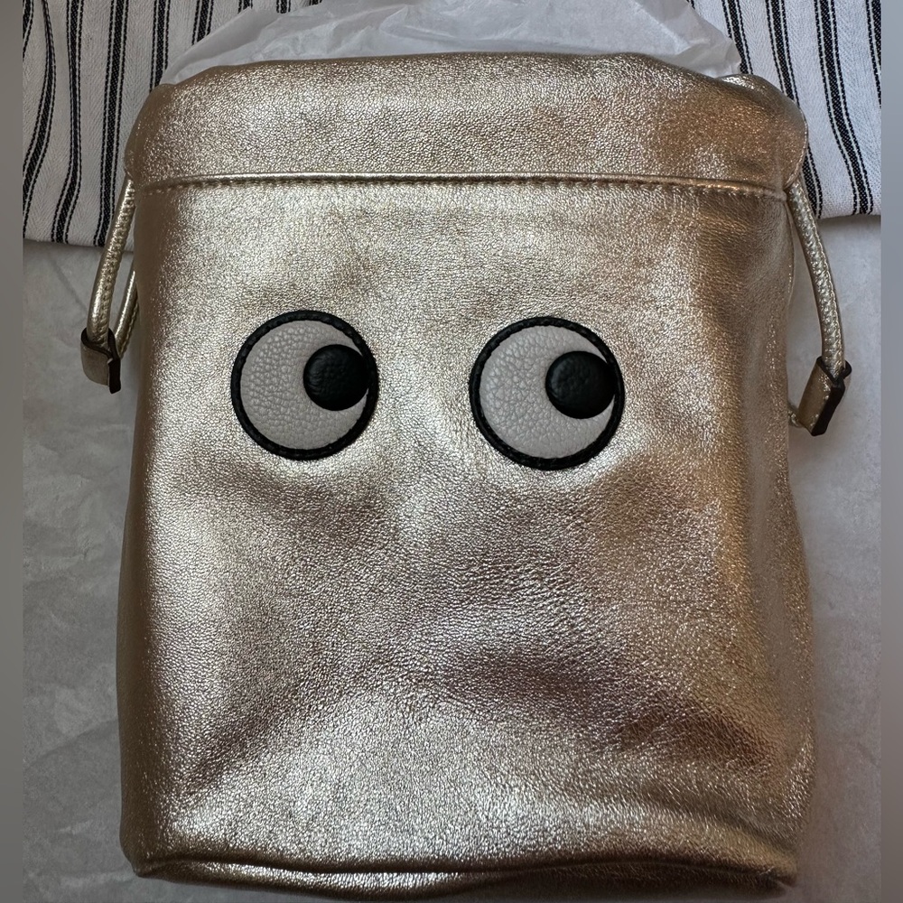 Anya Hindmarch Eyes Drawstring Pouch in Gold Metallic Nappa
